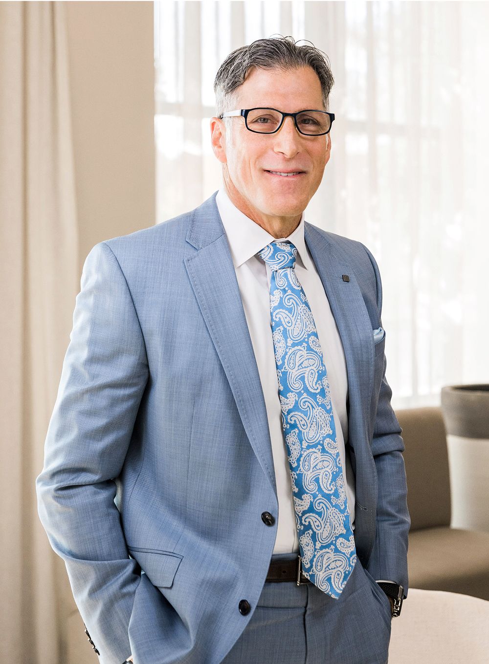 Model in casual lingerie setting indoors.