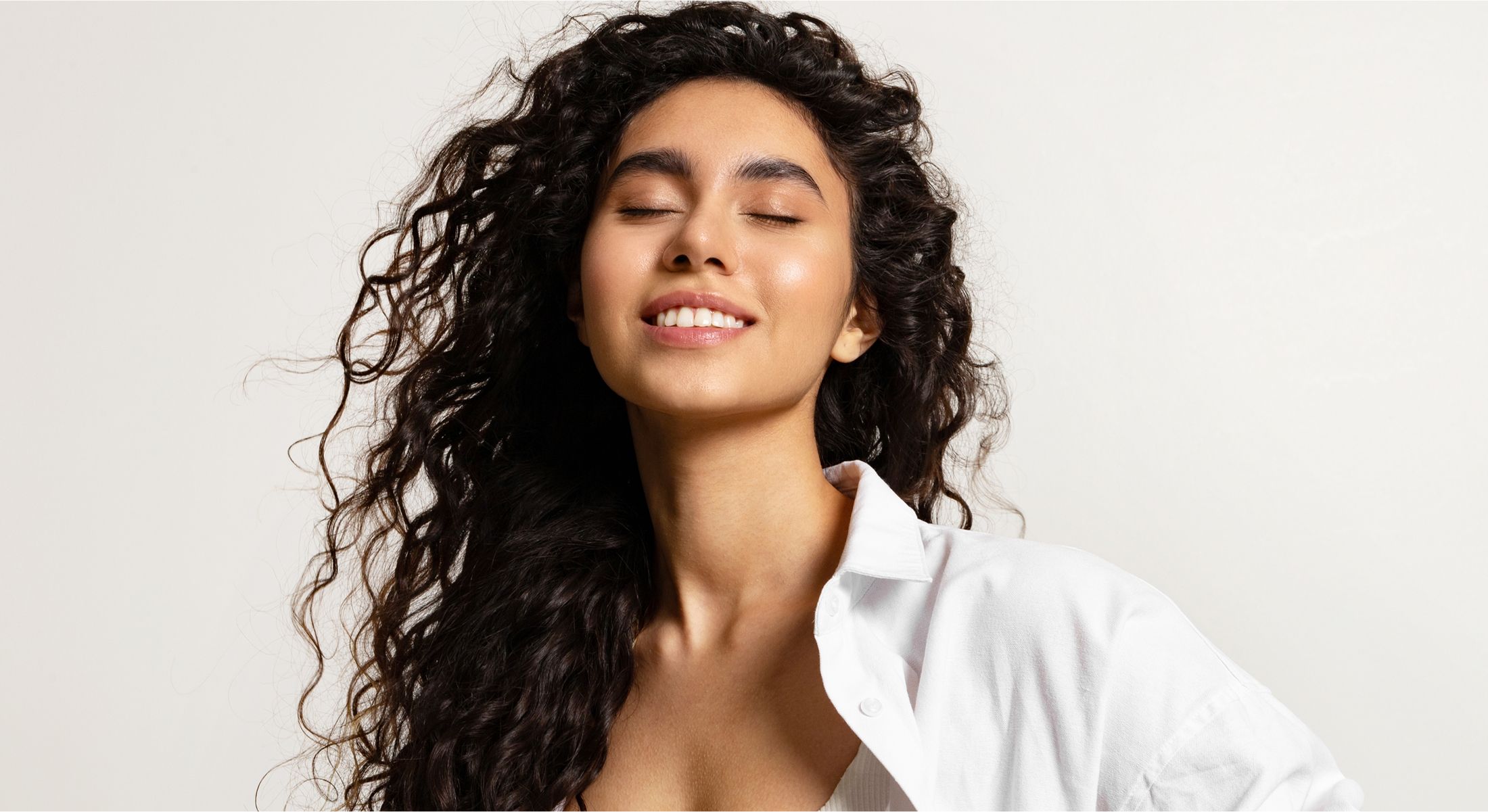 Modern reception area with sleek furniture and lighting.